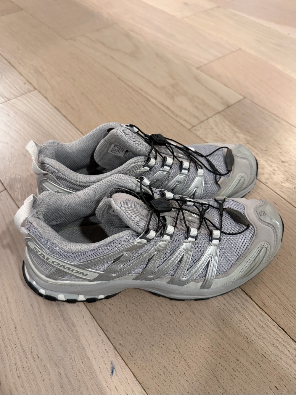 Grey Salomon sneakers. Size women’s 9
